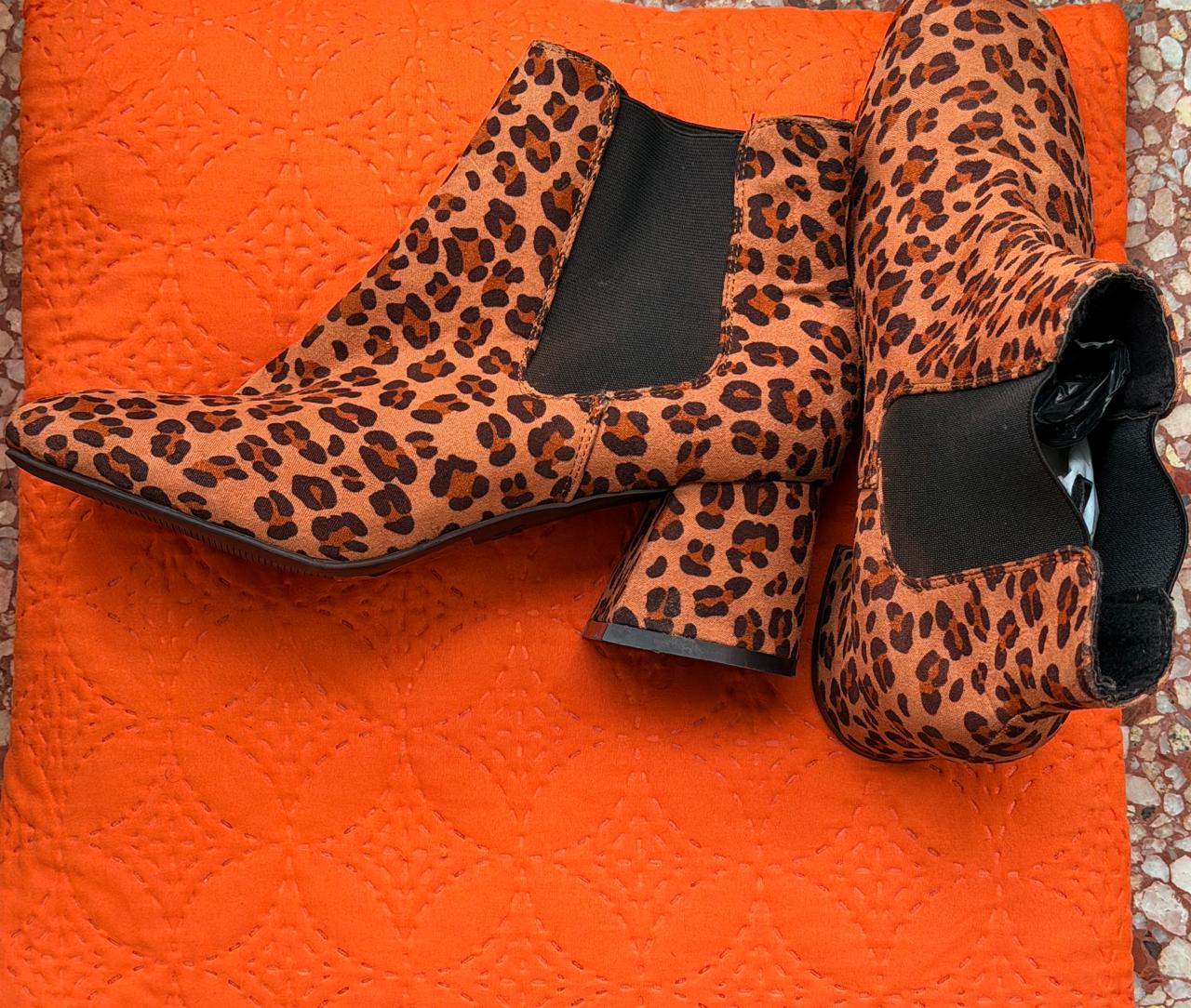 Animal Print Boots (size 6)
